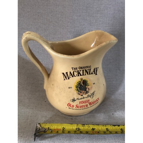 51 - MacKinlay finest old Scotch Whisky jug by Seton pottery.