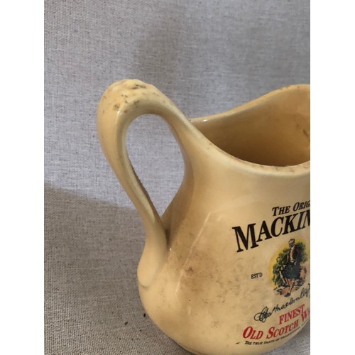 51 - MacKinlay finest old Scotch Whisky jug by Seton pottery.