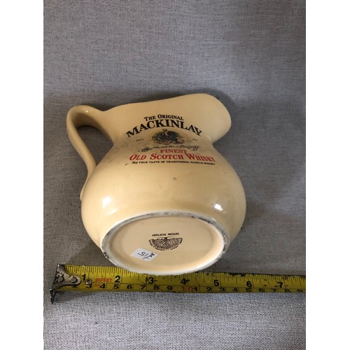 51 - MacKinlay finest old Scotch Whisky jug by Seton pottery.