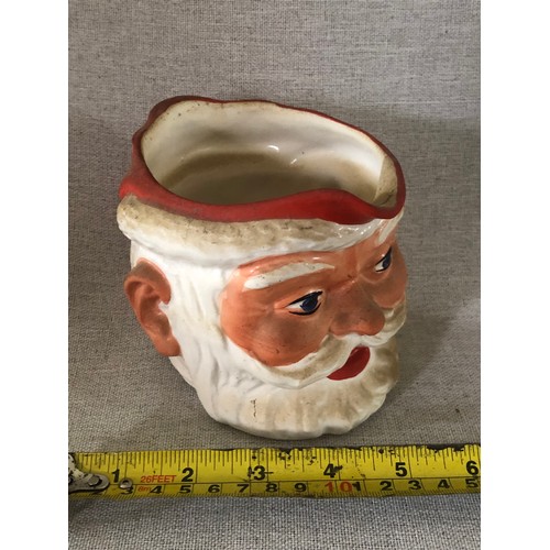 59 - Father Christmas pottery jug made in England.