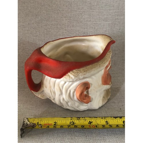 59 - Father Christmas pottery jug made in England.