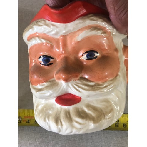 59 - Father Christmas pottery jug made in England.