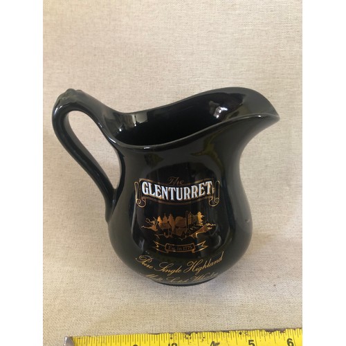 66 - Glenturret pure single Highland malt scotch whisky jug.