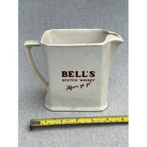 104 - Bell's 'Afore ye go' scotch whisky jug by Wade