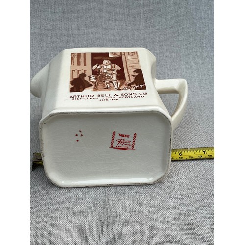 104 - Bell's 'Afore ye go' scotch whisky jug by Wade