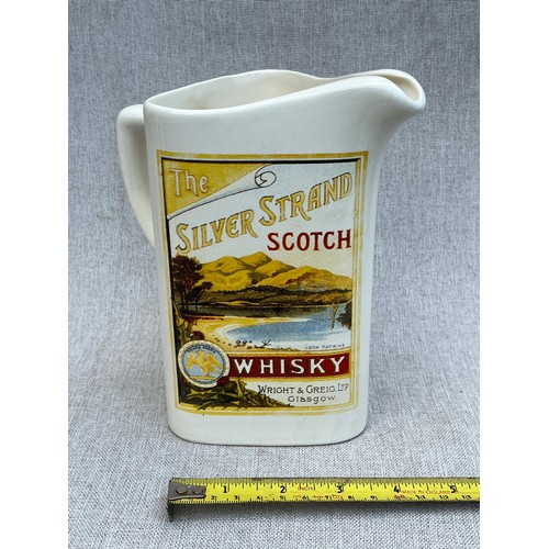 131 - The Silver Strand Scotch Whisky jug by Amberglade