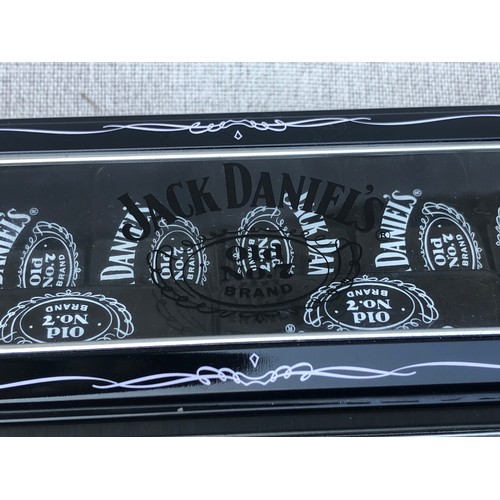 196 - Jack Daniel’s dominoes set complete in tin.