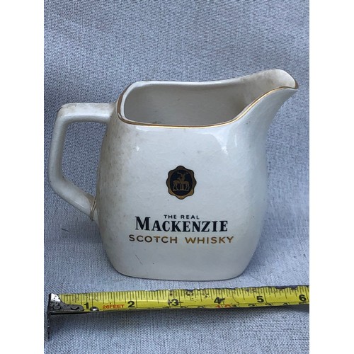 213 - The Real Mackenzie Scotch Whisky jug by Wade.