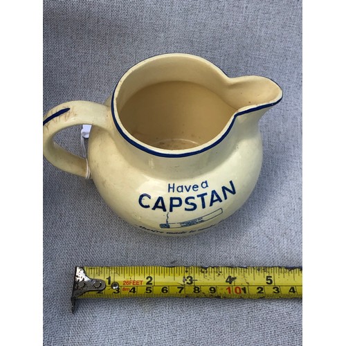 216 - Have a Capstan, they are made to make friends jug by Bovey Pottery.