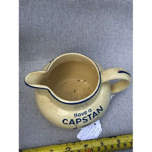 216 - Have a Capstan, they are made to make friends jug by Bovey Pottery.