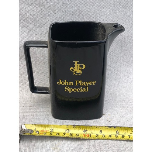 219 - J P S John Player Special jug by Wade.