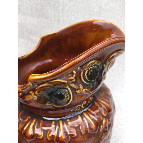 226 - Arthur Woods John Gilpin Horse Head Pitcher treacle glazed relief pattern jug with horse head handle... 