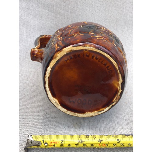 226 - Arthur Woods John Gilpin Horse Head Pitcher treacle glazed relief pattern jug with horse head handle... 