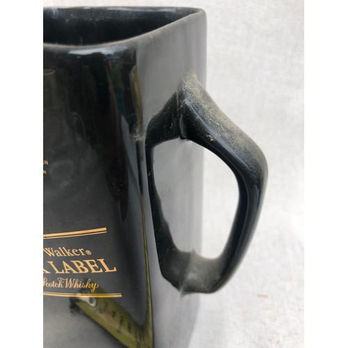 240 - Johnnie Walker Black label old scotch whisky Jug by Wade.