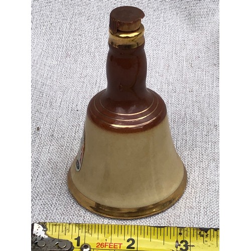 268 - Bell’s blended Scotch whisky bell shape decanter. Damage to plastic part of stopper