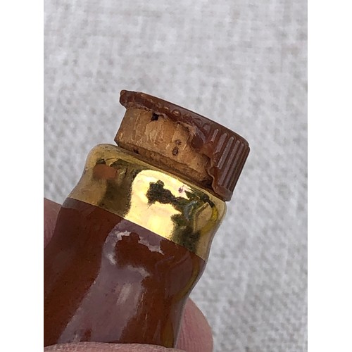 268 - Bell’s blended Scotch whisky bell shape decanter. Damage to plastic part of stopper