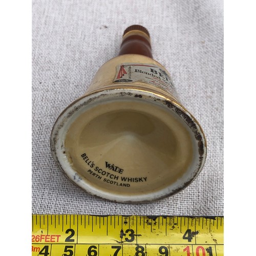 268 - Bell’s blended Scotch whisky bell shape decanter. Damage to plastic part of stopper