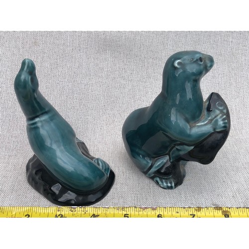 324 - Poole pottery otter with fish and seal on rock