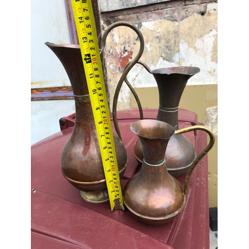 85 - MOD - 3 copper And brass ewers / jugs.