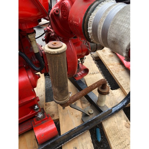 129 - MOD - Small Lister-Petter fire pump complete with 10m of hose. Seen and pictured working.