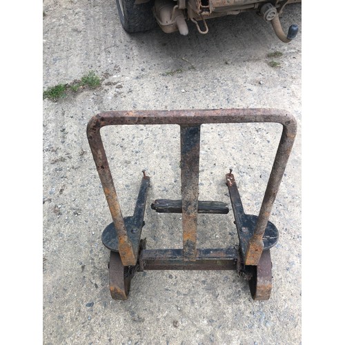 161 - Restoration project. A metal frame with cast iron wheels. Some kind of hand pulled truck, probably f... 