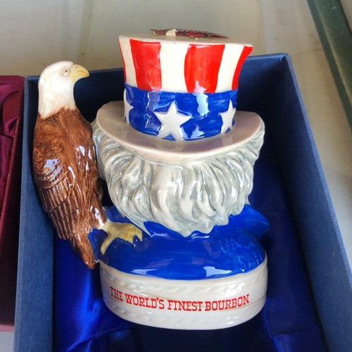 312 - Jim Beam 200ml Samrai Warrior and Uncle Sam collectors series toby jugs by Royal Doulton. New in box... 