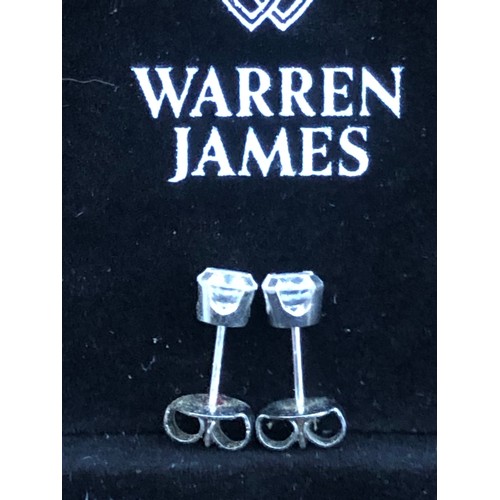 4 - Pair of stud earrings