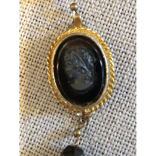 55 - Bead and cameo gold plated necklace wth black faceted stones