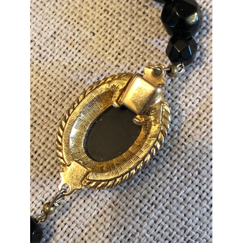 55 - Bead and cameo gold plated necklace wth black faceted stones