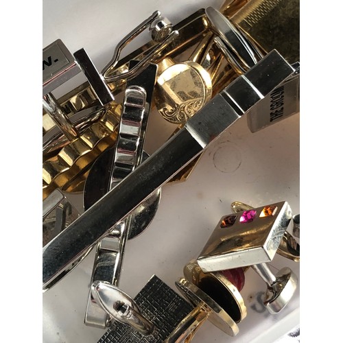 77 - Collection of gold plated cuff links, tie pins, Ferrari money clip and other costume jewellery