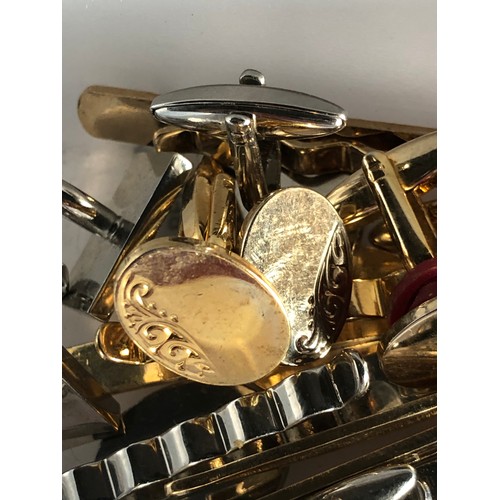 77 - Collection of gold plated cuff links, tie pins, Ferrari money clip and other costume jewellery