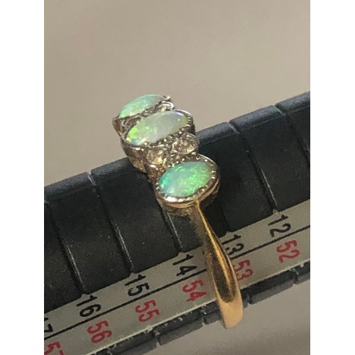 97 - Vintage 18 carat hallmarked gold, green and blue seam opal & diamond set ring. Size N