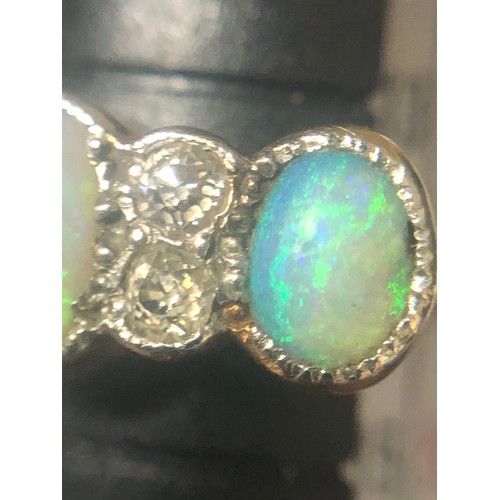 97 - Vintage 18 carat hallmarked gold, green and blue seam opal & diamond set ring. Size N