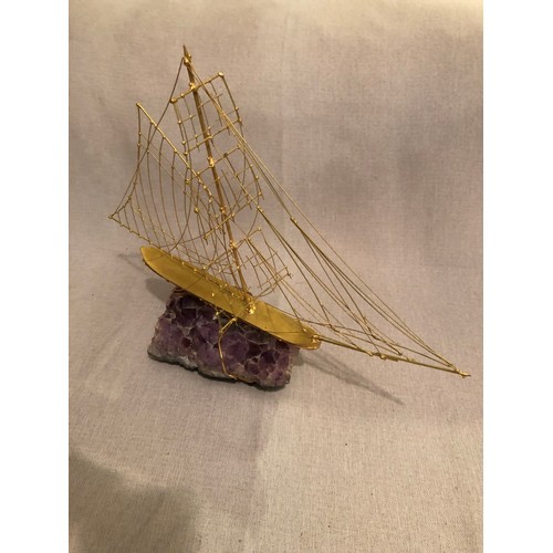 169 - 24 Kt gold plated Italian hand made metal ship on a large Amethyst crystal specimen