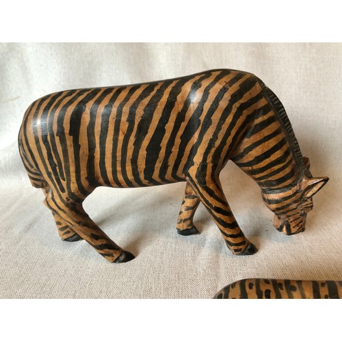 178 - A pair of hand carved wooden trbal art Zebras