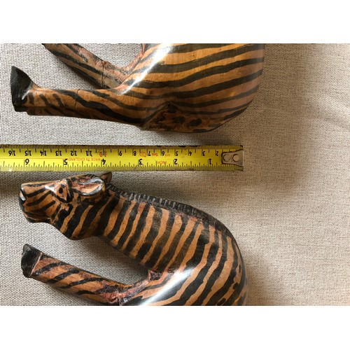 178 - A pair of hand carved wooden trbal art Zebras