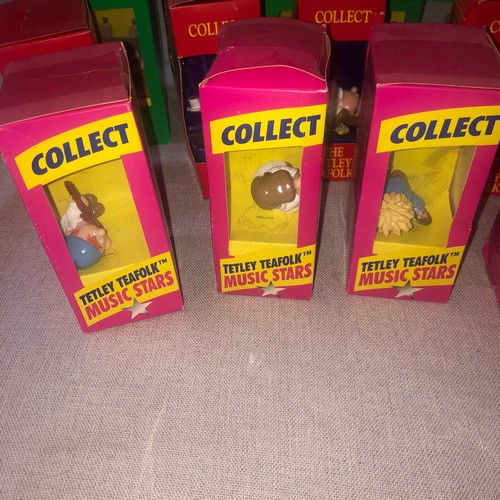 181 - Tetley collectable figurines in boxes.