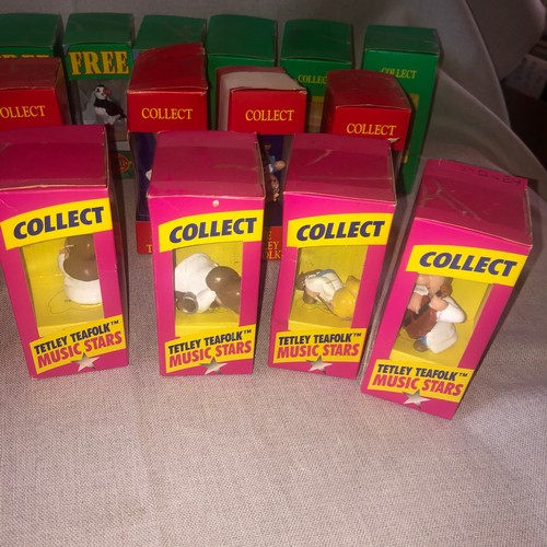 181 - Tetley collectable figurines in boxes.