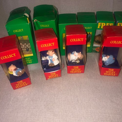 181 - Tetley collectable figurines in boxes.