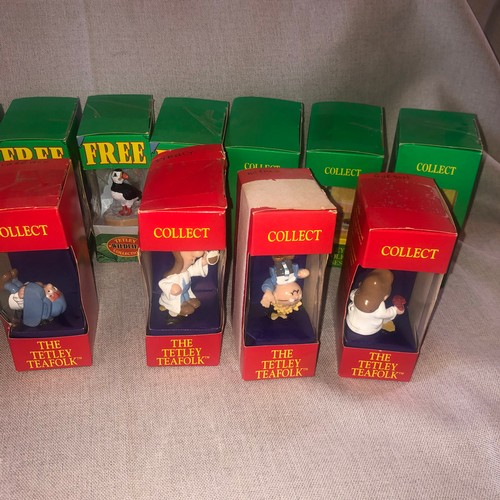 181 - Tetley collectable figurines in boxes.