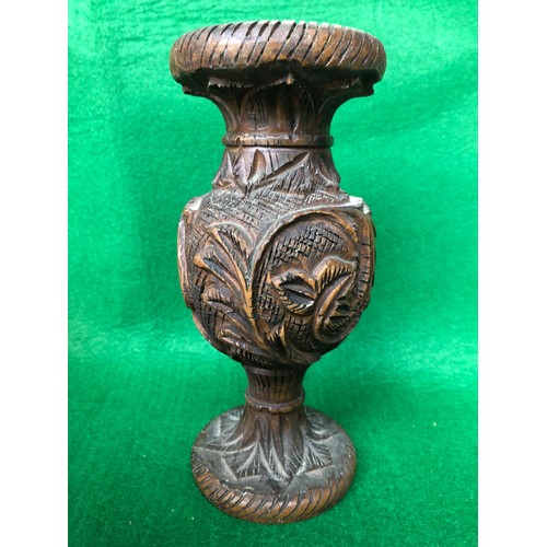 197 - Wooden tribal art vase decorated with carved camel and palm trees.