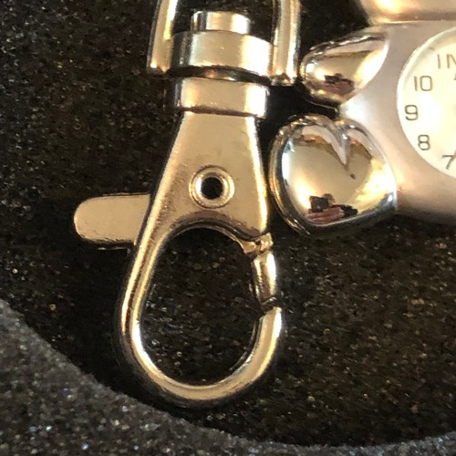 204 - Key ring watch and a tealight candle holder