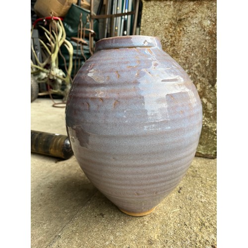 321 - Large glazed pottery globular vase. Signed. Flowers not included