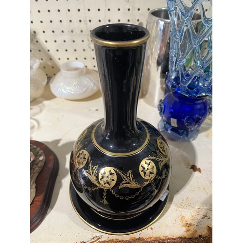 335 - 19th century black glazed vase with gilt decoration. Reistration diamond indicating 1869