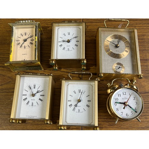 375 - 5 quartz carriage clocks and a wind up alarm clock