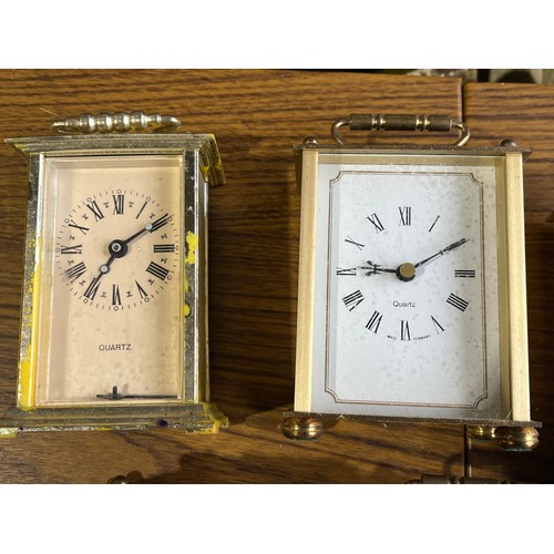 375 - 5 quartz carriage clocks and a wind up alarm clock