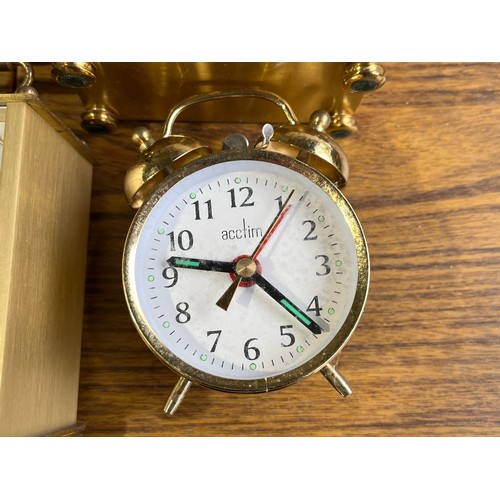 375 - 5 quartz carriage clocks and a wind up alarm clock