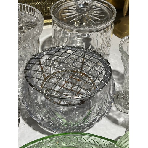 409 - A collection of cut crystal lidded jars a bowl and a green glass fish dish