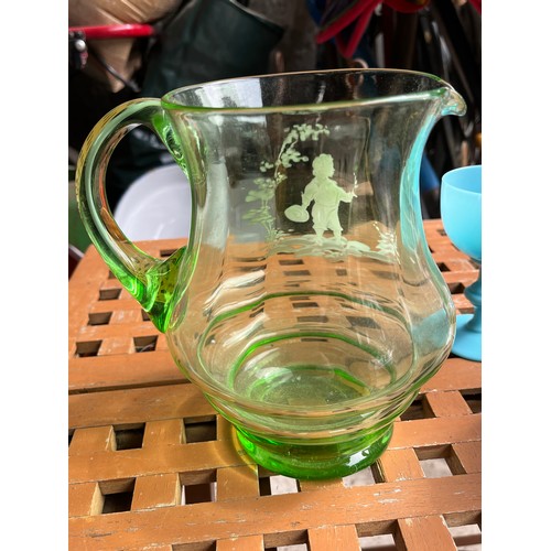 429 - Mary Gregory enameled green glass lemonade jug