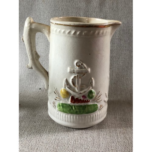 506 - Staffordshire pottery milk jug with raised molding in a nautical theme